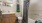 a bathroom with a tub, toilet, and sink