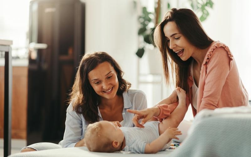 a mom and a daughter and a baby