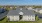a large building with a spacious lawn